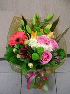 Roses, hydreangea, asiatic lilies, alstroemeria, pompoms, gerbera, and greens