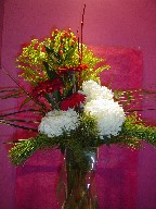Commercial mum, gerbera, berries, solidago, and sparkle branch