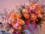 Pink roses, alstroemeria, and limonium