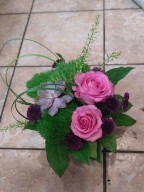 Roses, succulent, dianthus, pompoms, thlaspia, and monkey grass