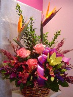 Bird of paradise, heather, roses, alstroemeria, lilies, dendrobium orchids, and statice