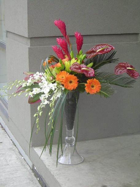 Anthurium, ginger, lillies, roses, gerbera, sago palm, dendrobium and cymbidium orchids, and monkey grass