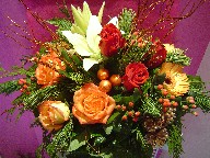 Lillies, berries, gerbera, roses, pine, cones, Christmas branch and decorations