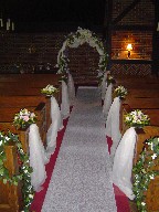 Altar arrangements and decorations with wedding arch