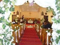 Wedding arch and aisle decorations