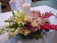 Snapdragon, lillies, roses, alstroemeria, and waxflowers